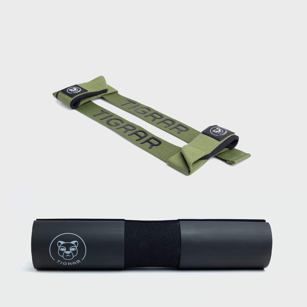Combinatie van groene lifting straps en zwarte Tigrar barbell pad, beide duurzaam en ontworpen voor efficiënte krachtuitoefening.
