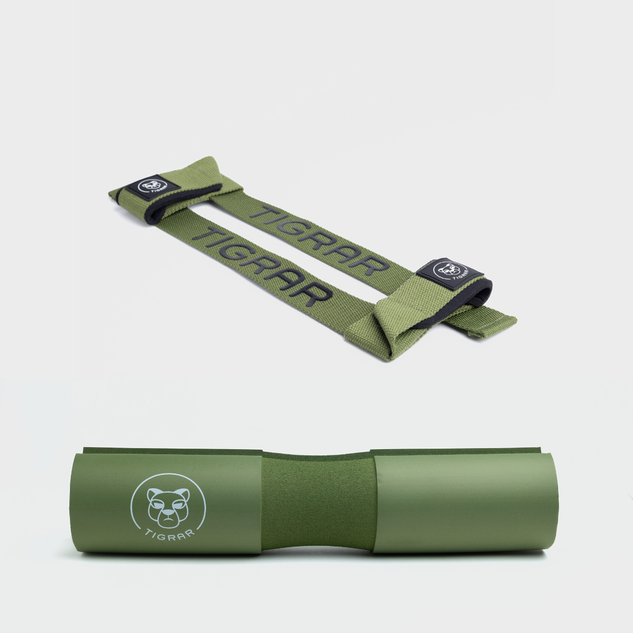 Groene Tigrar lifting straps en barbell pad, geoptimaliseerd voor duurzaamheid en comfort tijdens training.