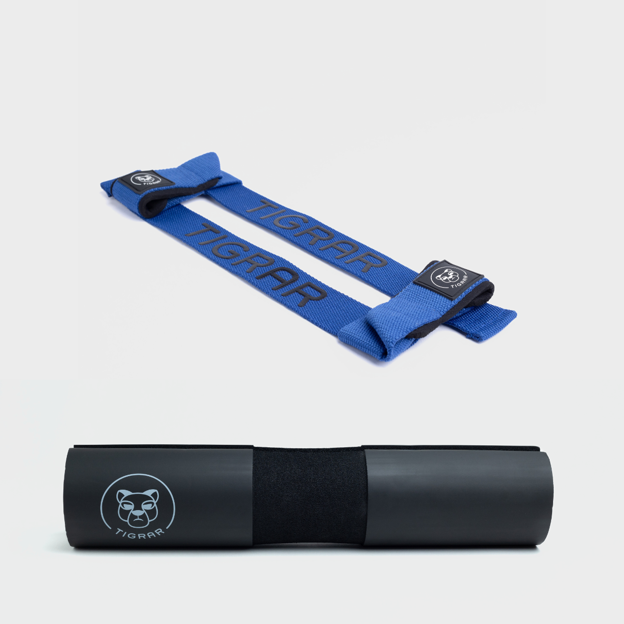Veilige set van blauwe lifting straps en zwarte Tigrar barbell pad, anti-slip voor extra stabiliteit tijdens liften.