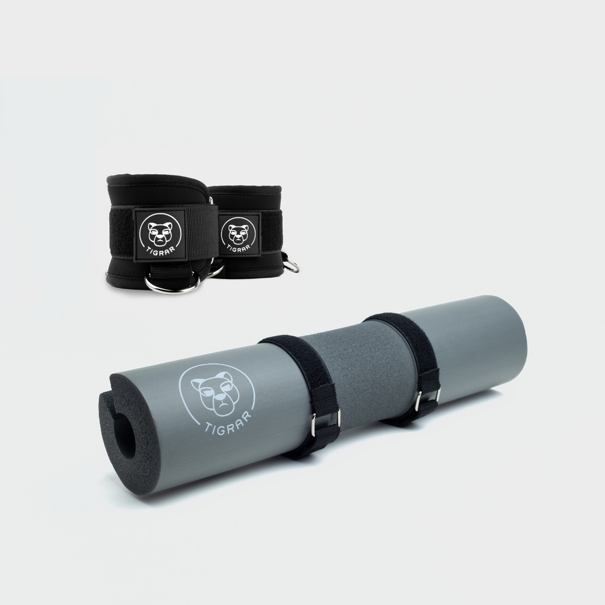Tigrar bundel met grijze barbell pad en zwarte enkel straps voor fitness