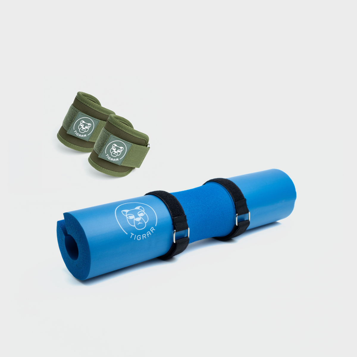 Blauwe hip thrust pad en groene enkel strap set. comfort en ondersteuning voor fitness oefeningen.