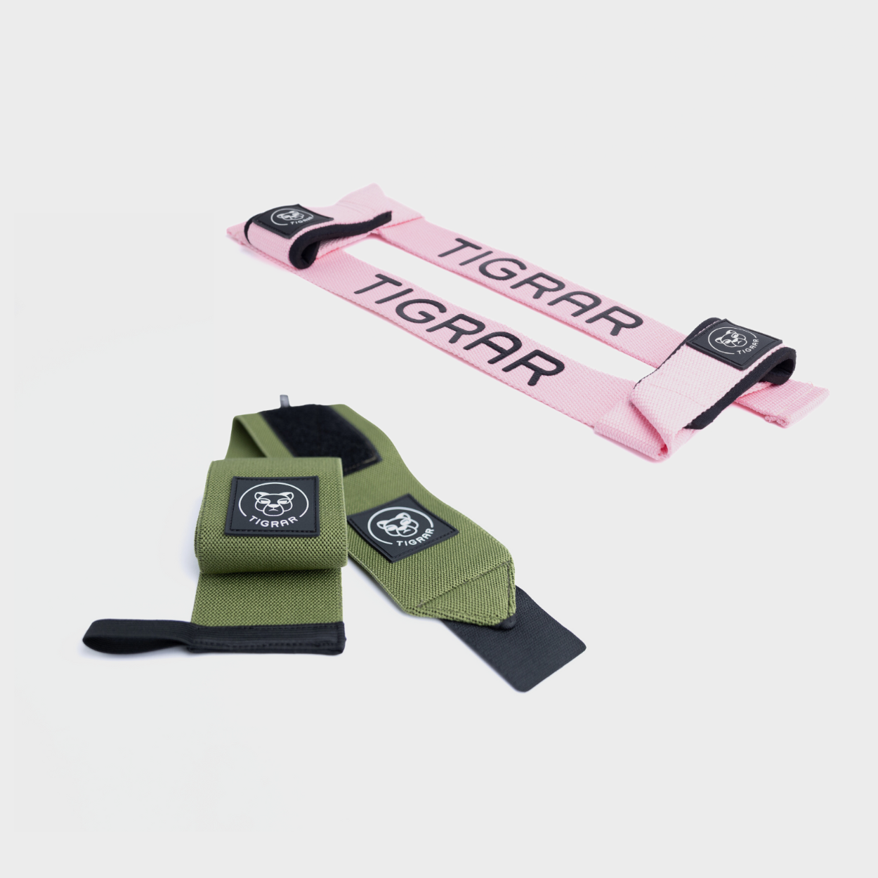 Groene fitness wrist wraps en roze lifting straps van Tigrar voor stabiliteit en veiligheid bij krachttraining