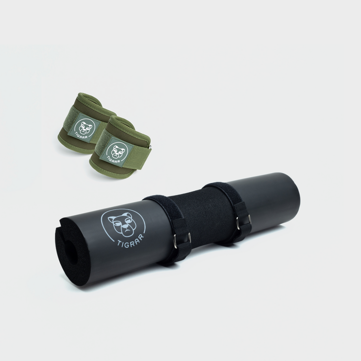 Tigrar zwarte hip thrust pad en groene enkel straps, ideaal voor krachttraining.