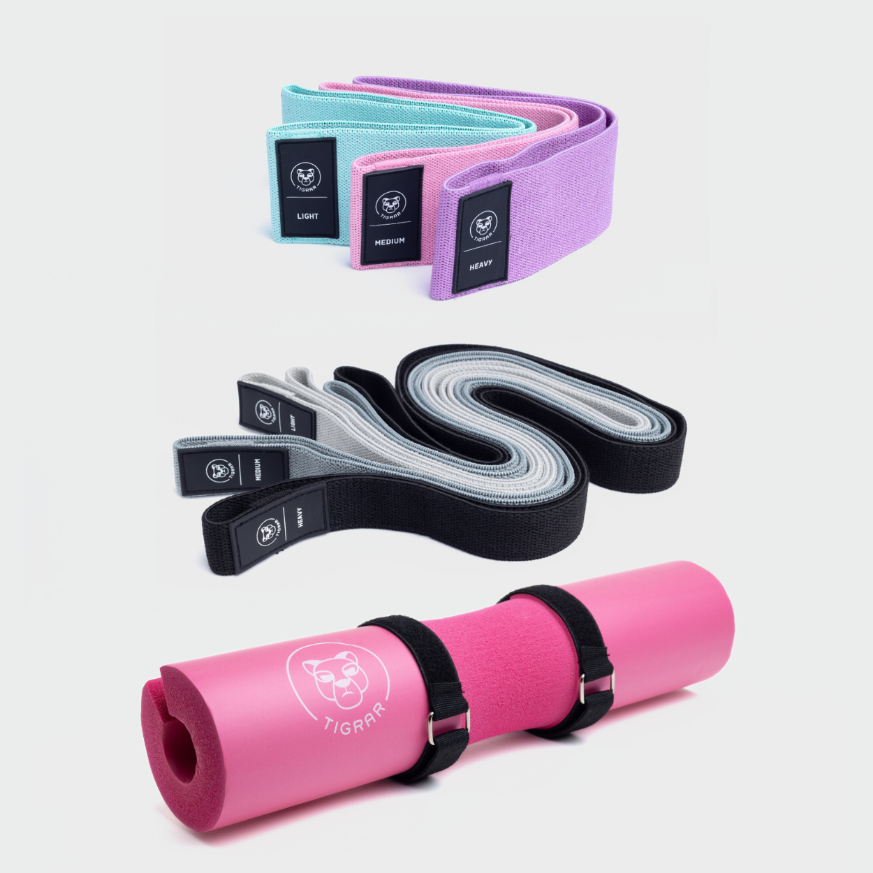 Bundel met roze Tigrar barbell pad en 6 fitness elastieken in diverse kleuren