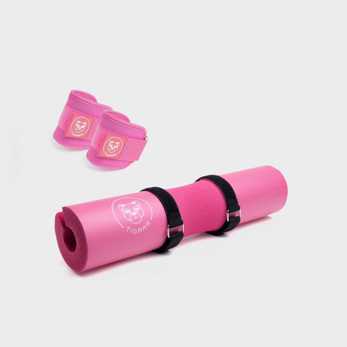 Roze barbell pad en roze enkel straps, comfortabele ondersteuning voor gewichtheffen.