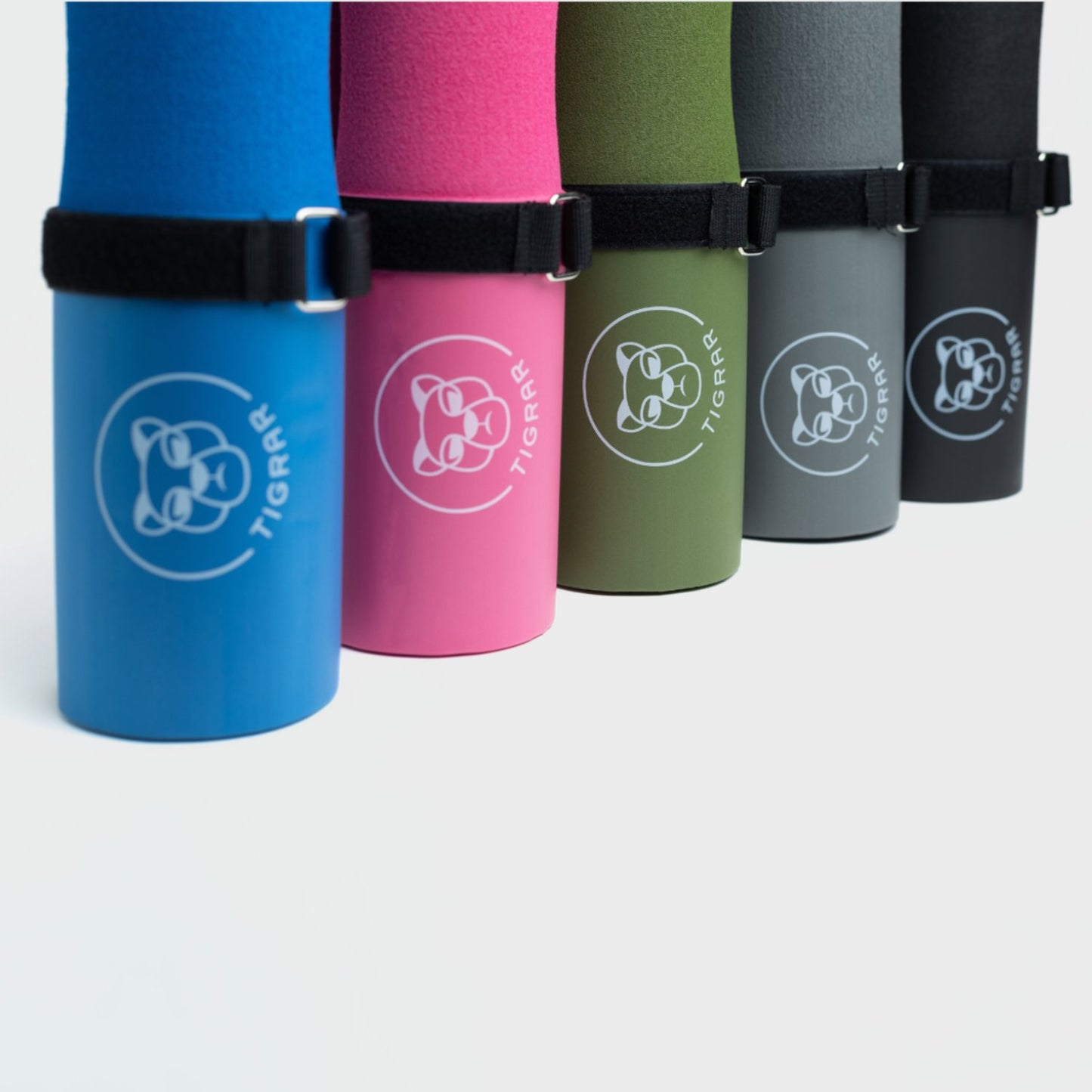 Kleurvariaties van de Tigrar barbell pad set: blauw, roze, groen, grijs en zwart
