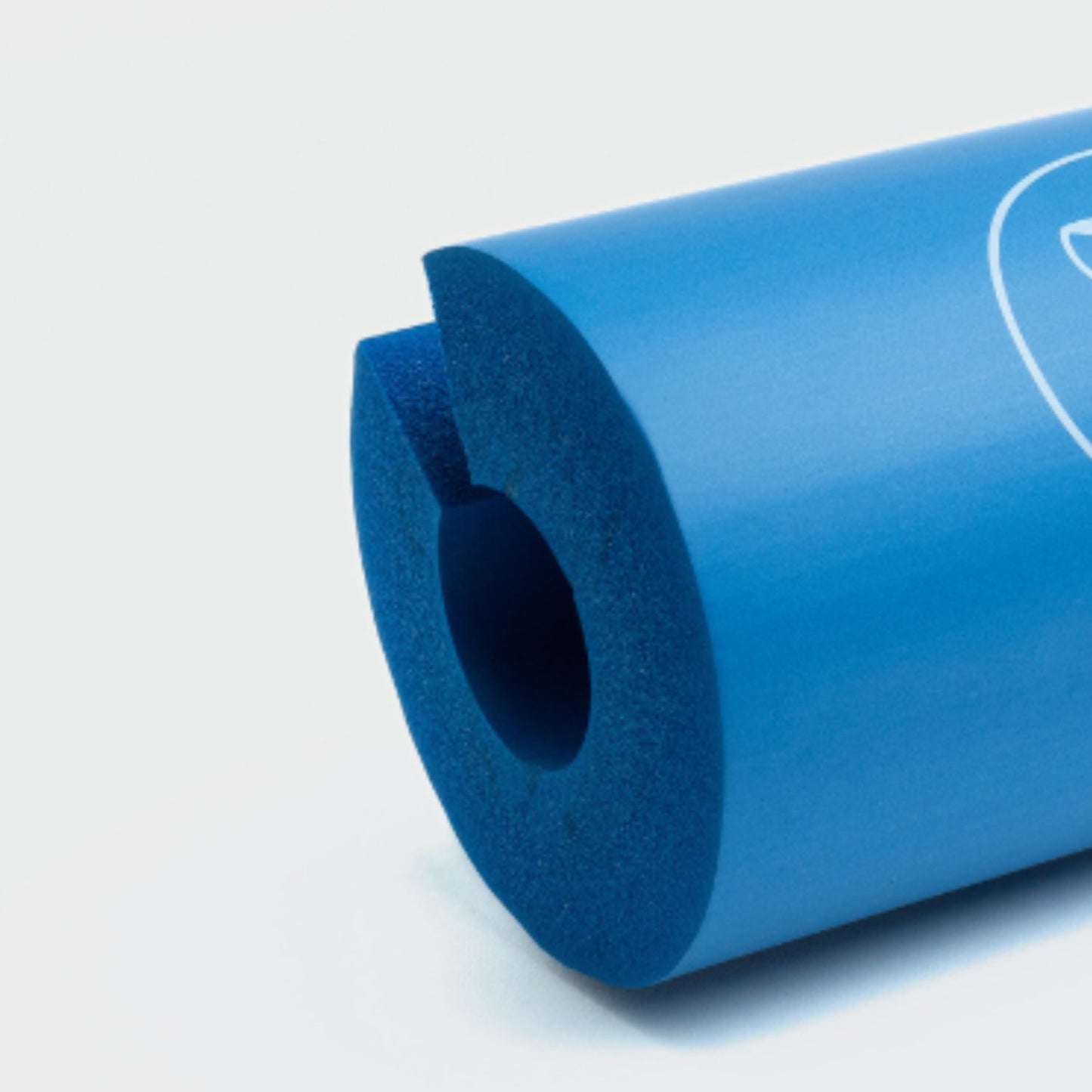 Detailfoto toont foamstructuur van blauwe Tigrar fitness barbell pad