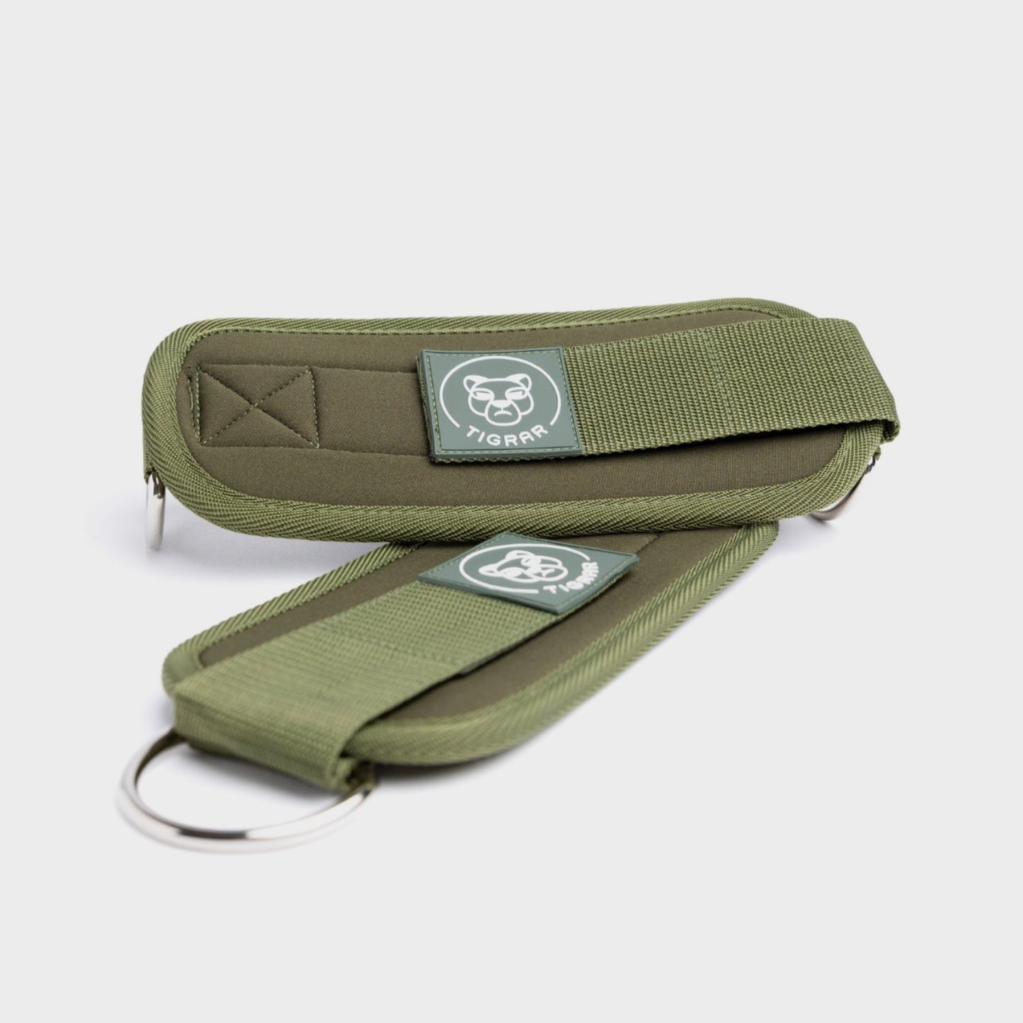 Groene Tigrar enkel strap met verstelbare sluiting, biedt steun bij lunges en bilspieroefeningen.