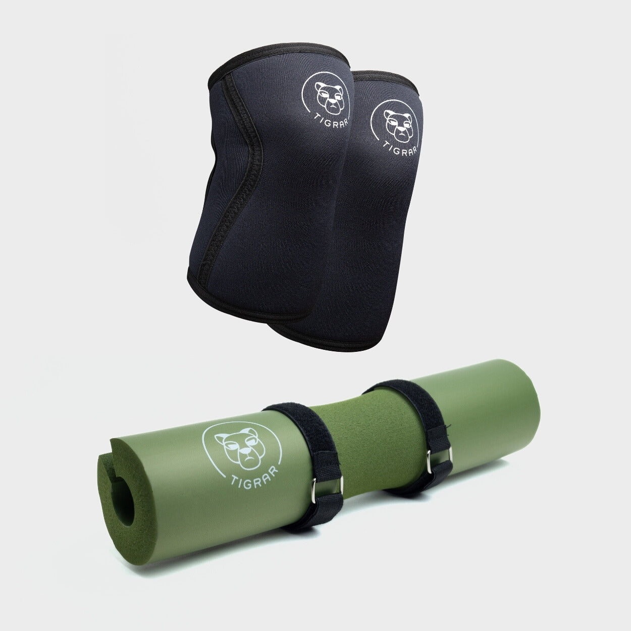 Tigrar's set van zwarte knee sleeves en groene barbell pad biedt ultieme ondersteuning voor effectieve squats en hip thrusts.