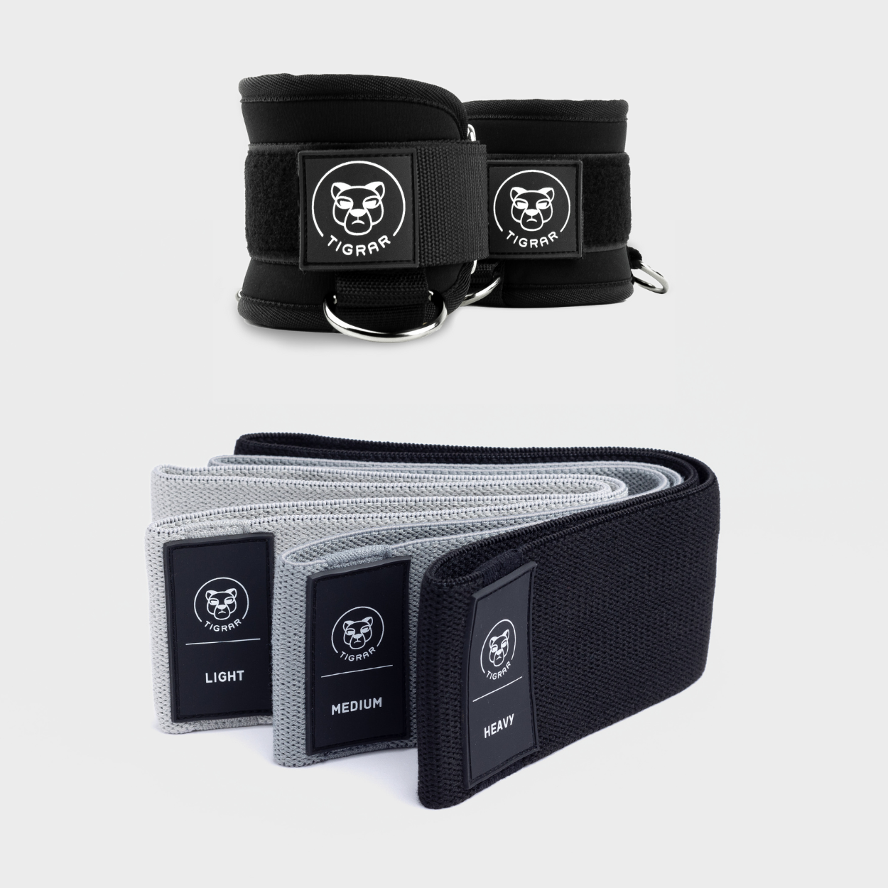 Tigrar Glutes & Thighs Transformation pack met light, medium en heavy booty bands en zwarte gym ankle straps
