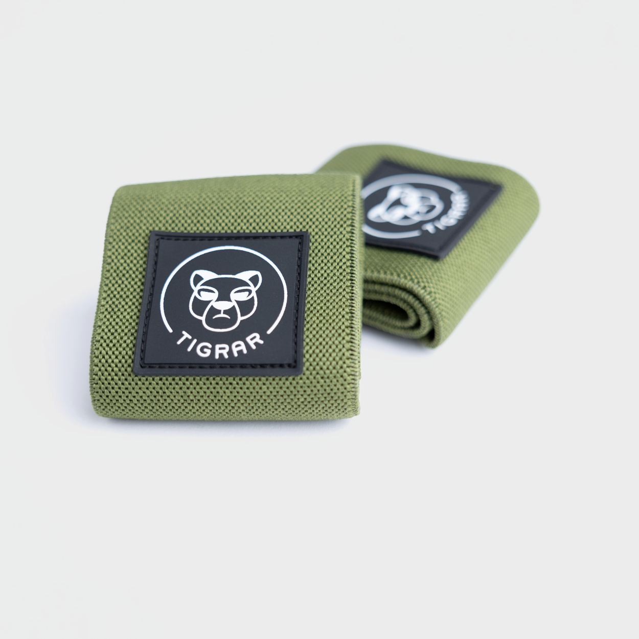 Set groene wrist wraps van Tigrar, essentieel voor polsstabiliteit en veiligheid