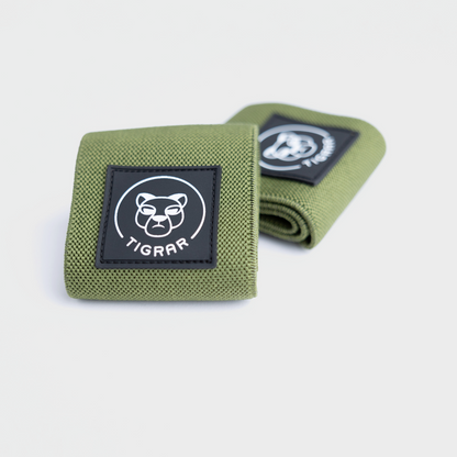 Set groene wrist wraps van Tigrar, essentieel voor polsstabiliteit en veiligheid