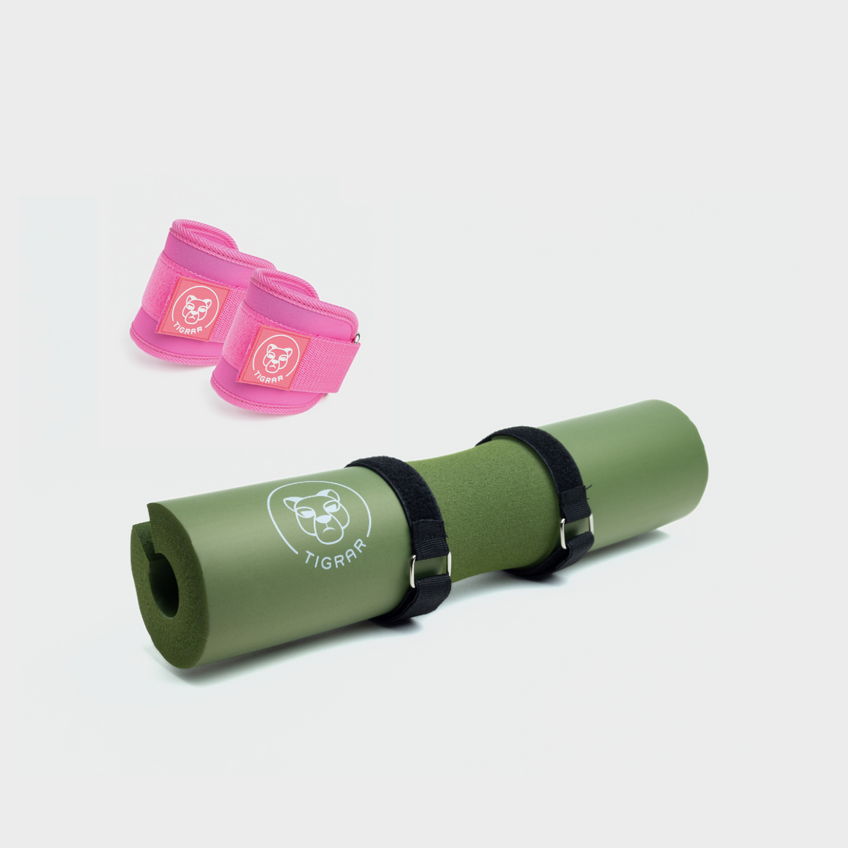 Groene barbell pad en roze gym enkel straps, comfortabele ondersteuning voor hip thrusts.