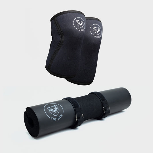 Zwarte Tigrar fitness accessoires getoond als een bundel set met strak ontworpen knee sleeves en een comfort verhogende barbell pad.