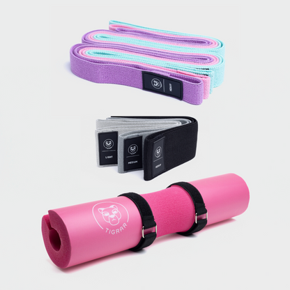 Roze barbell bar pad met korte en lange weerstandsbanden in verschillende kleuren
