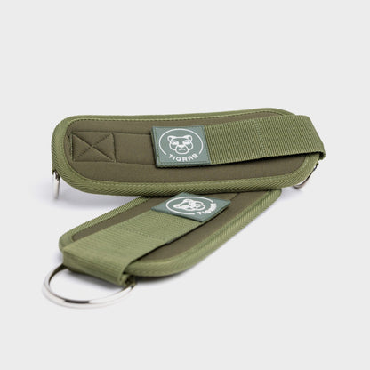 Groene Tigrar enkel strap met verstelbare sluiting, biedt steun bij lunges en bilspieroefeningen.