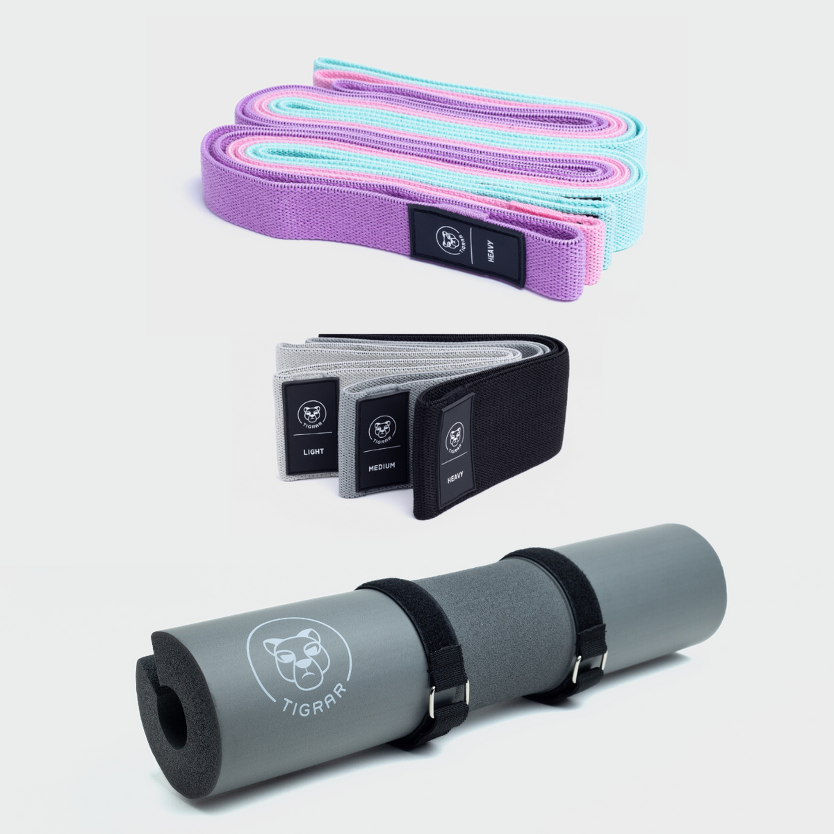 Grijze Tigrar barbell pad met drie lange gekleurde en drie korte donkere weerstandsbanden.