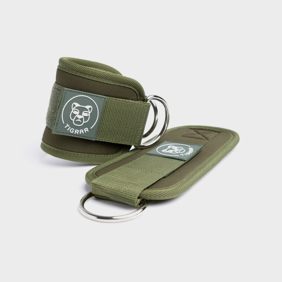 Groene Tigrar ankle straps met comfortabele voering, geschikt voor krachttraining en balansverbetering.