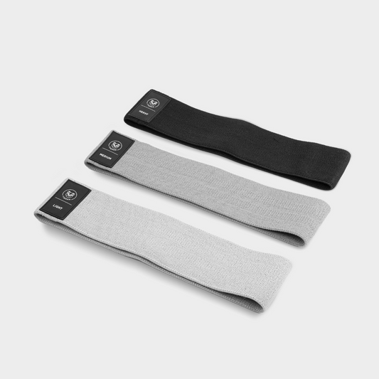 Zwarte, grijze en lichtgrijze booty band set van Tigrar, netjes gepositioneerd voor weergave.