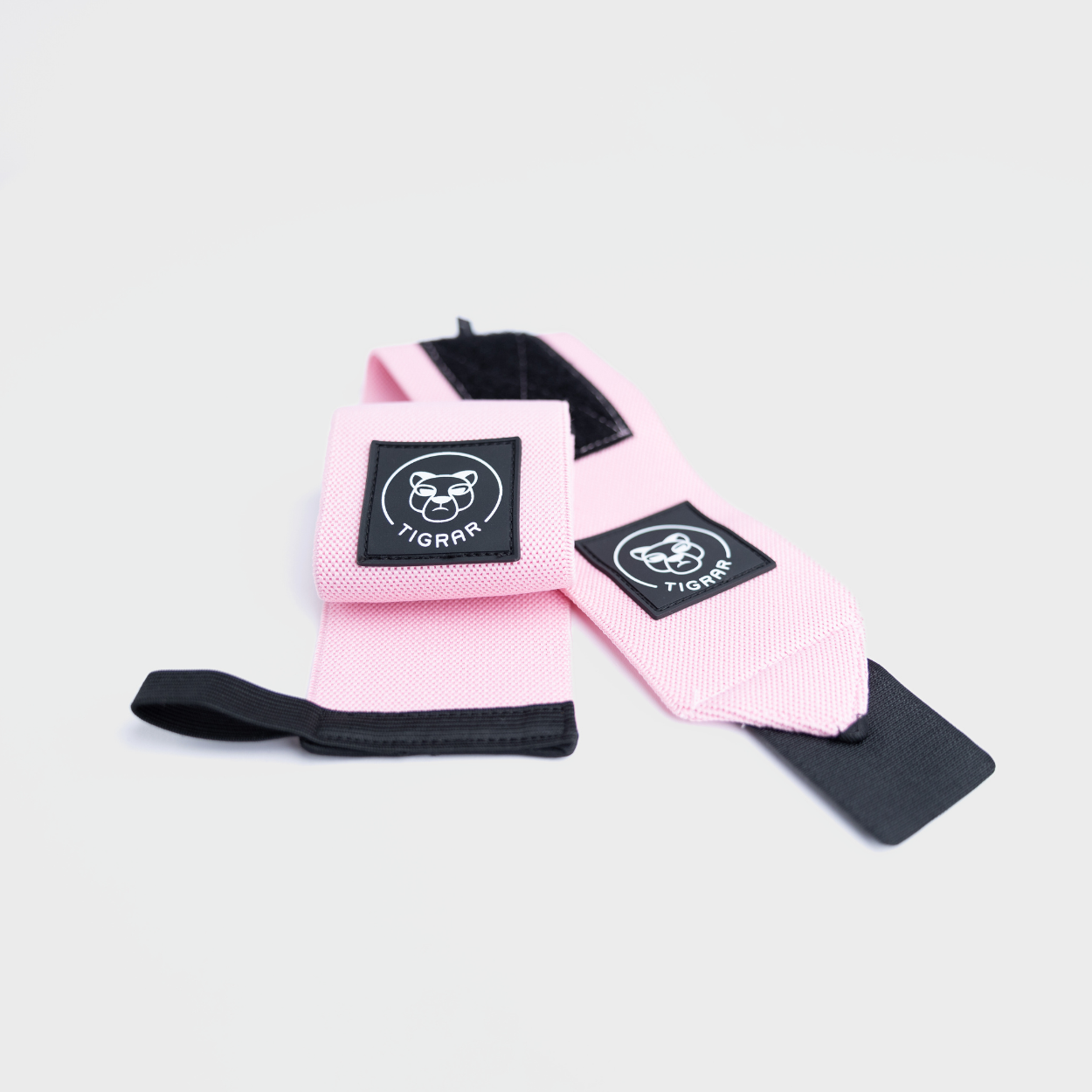 Functionele roze Tigrar wrist wraps, voor verbeterde bescherming en steun